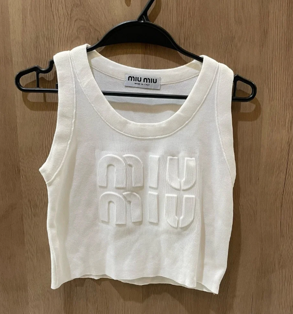 Miu Miu. Tops - Miu Miu White Embossed Logo Tank Top